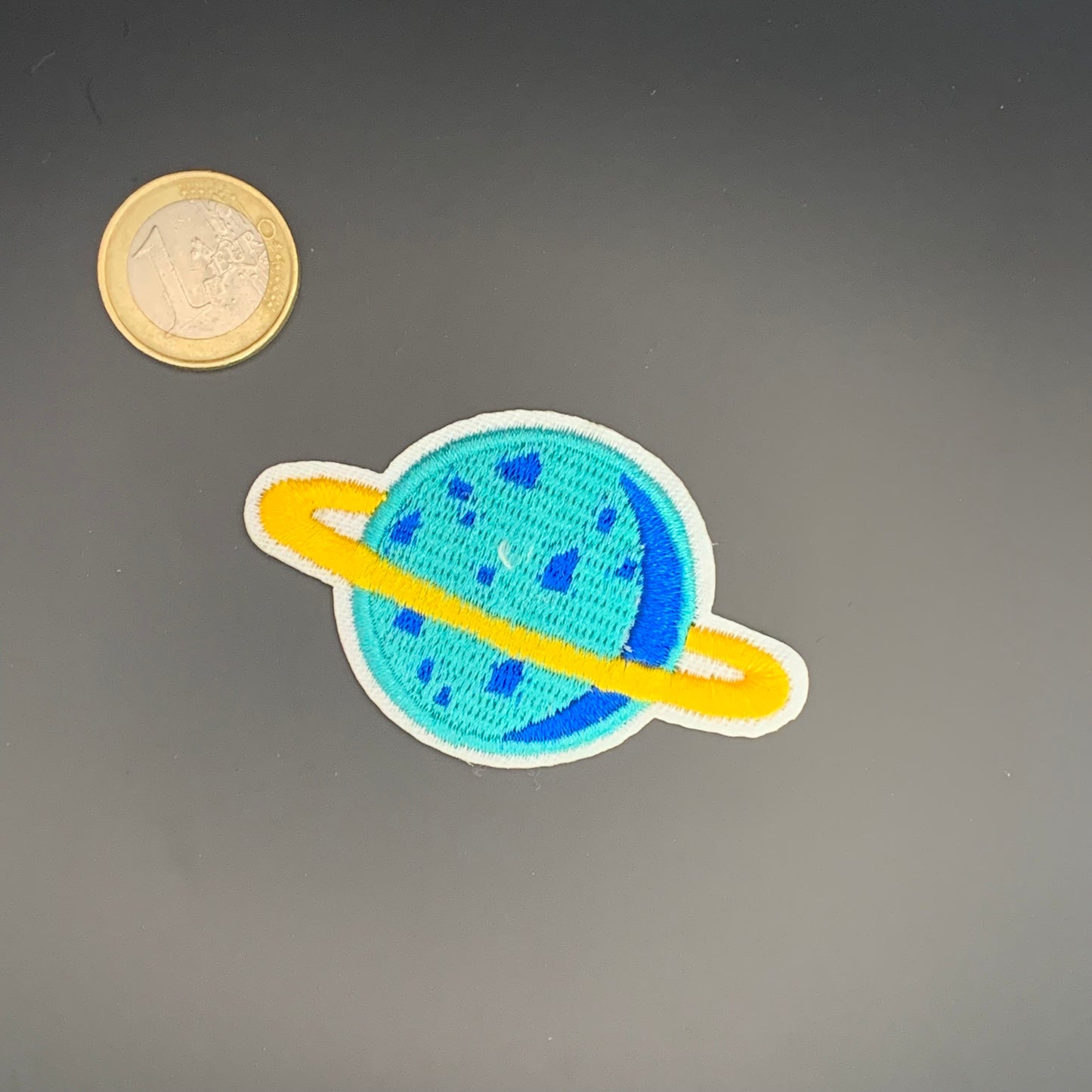 Planeet Gele Rand Insigne