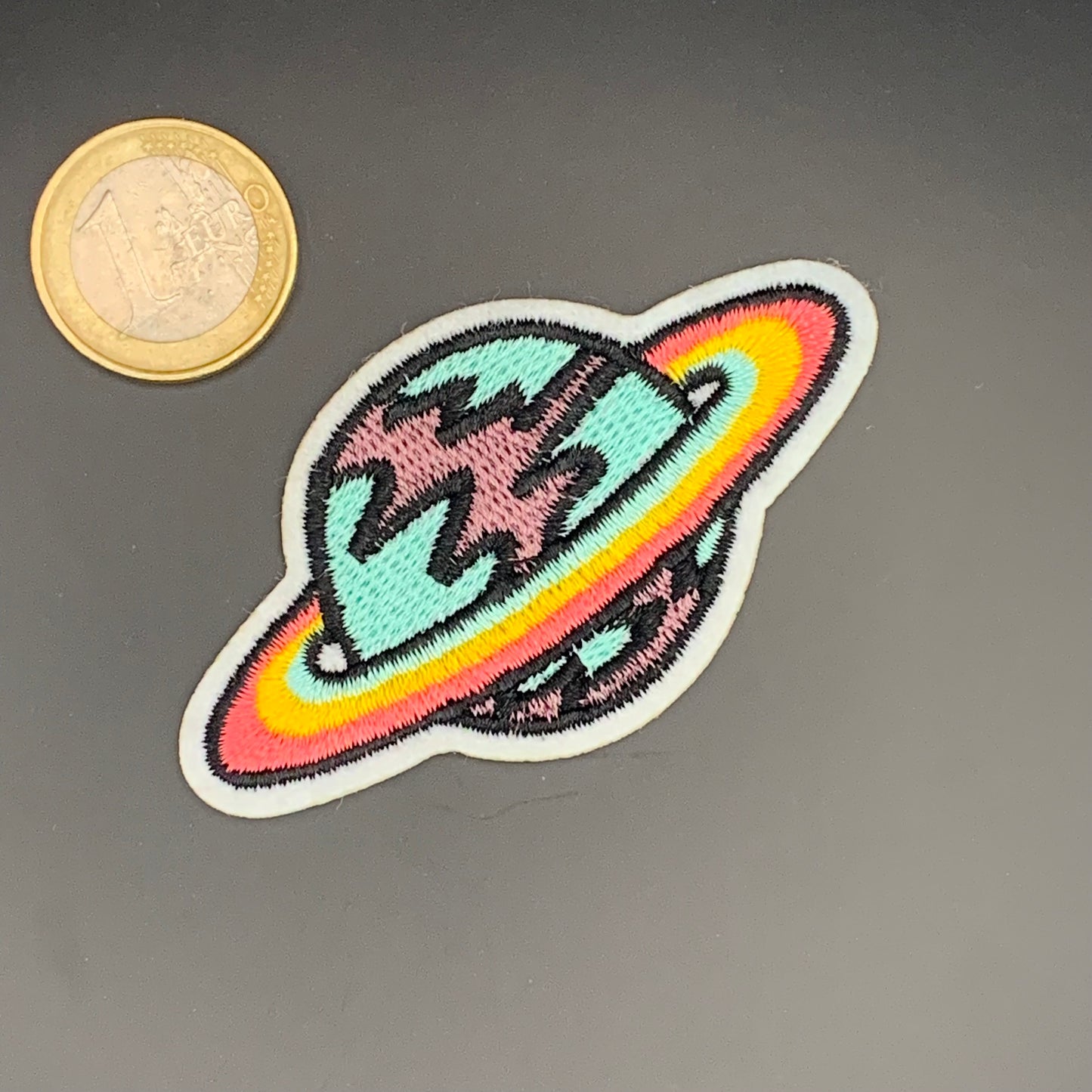 Planeet Regenboog Insigne